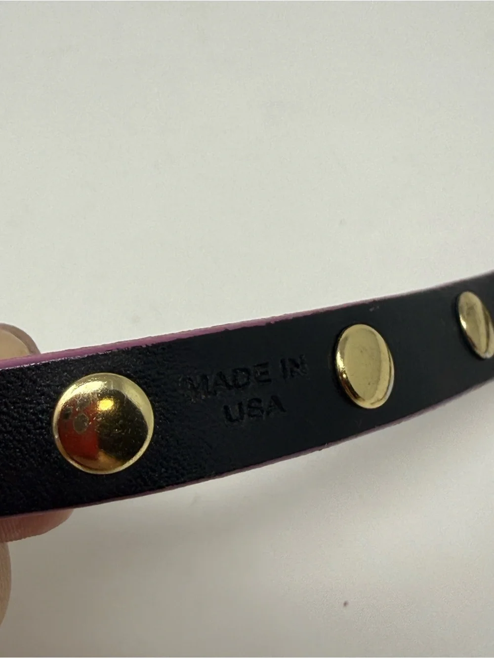Magenta Tory Burch double-wrap leather bracelet accented with gold-tone logo